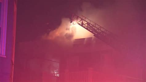 Firefighter hospitalized after battling fire in vacant home under construction in Dorchester